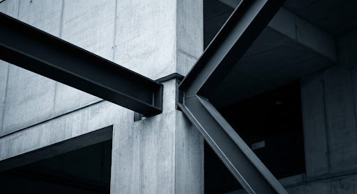 Intersecting concrete and steel beams